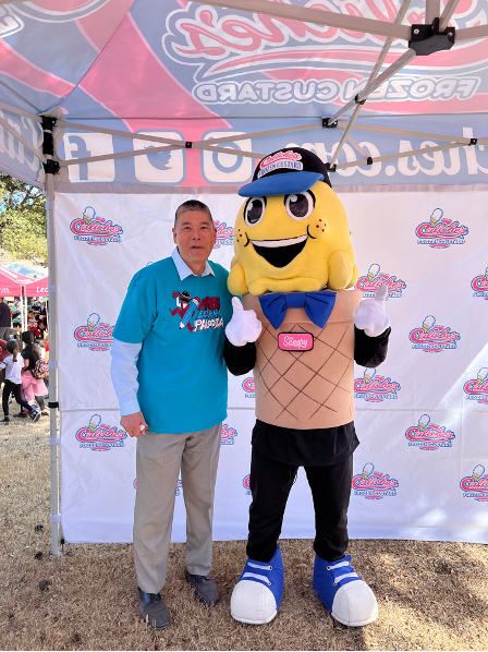 Provost Shoho standing with Scoopy, the Caliches Mascot, at HEST's Learn-a-Palooza. 