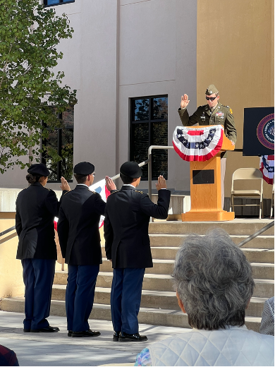 Students take an oath at the Military and Veterans Appreciation ceremony at the Memorial Tower.