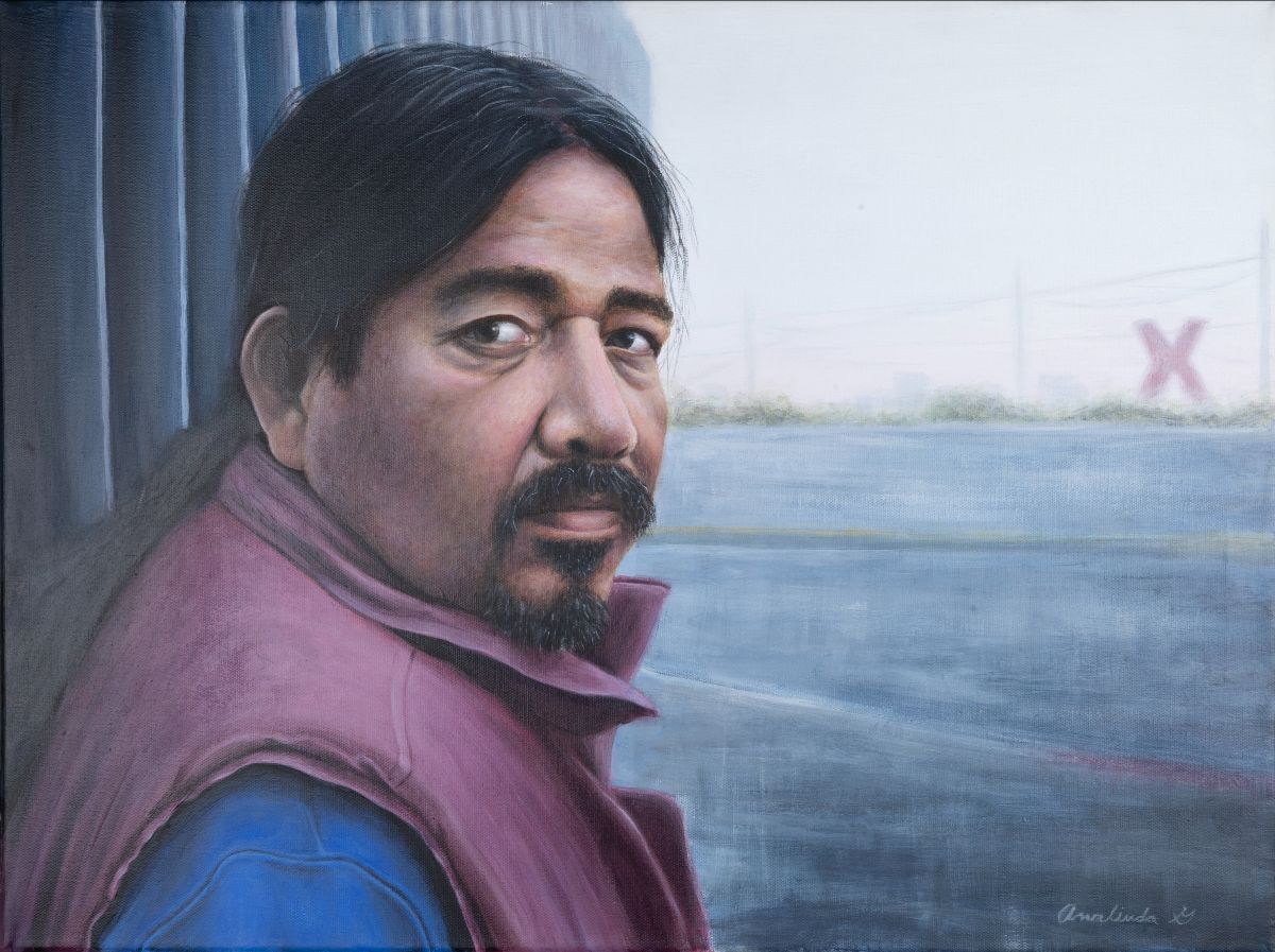 Painting of a man at the US-Mexico border with the "X" sculpture at the Juarez Border Crossing in the background. The painting is entitled "Separated" and is done by NMSU alumna Analinda Gonzalez.