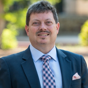 Headshot of Dean of the College of Business, Bryan Ashenbaum