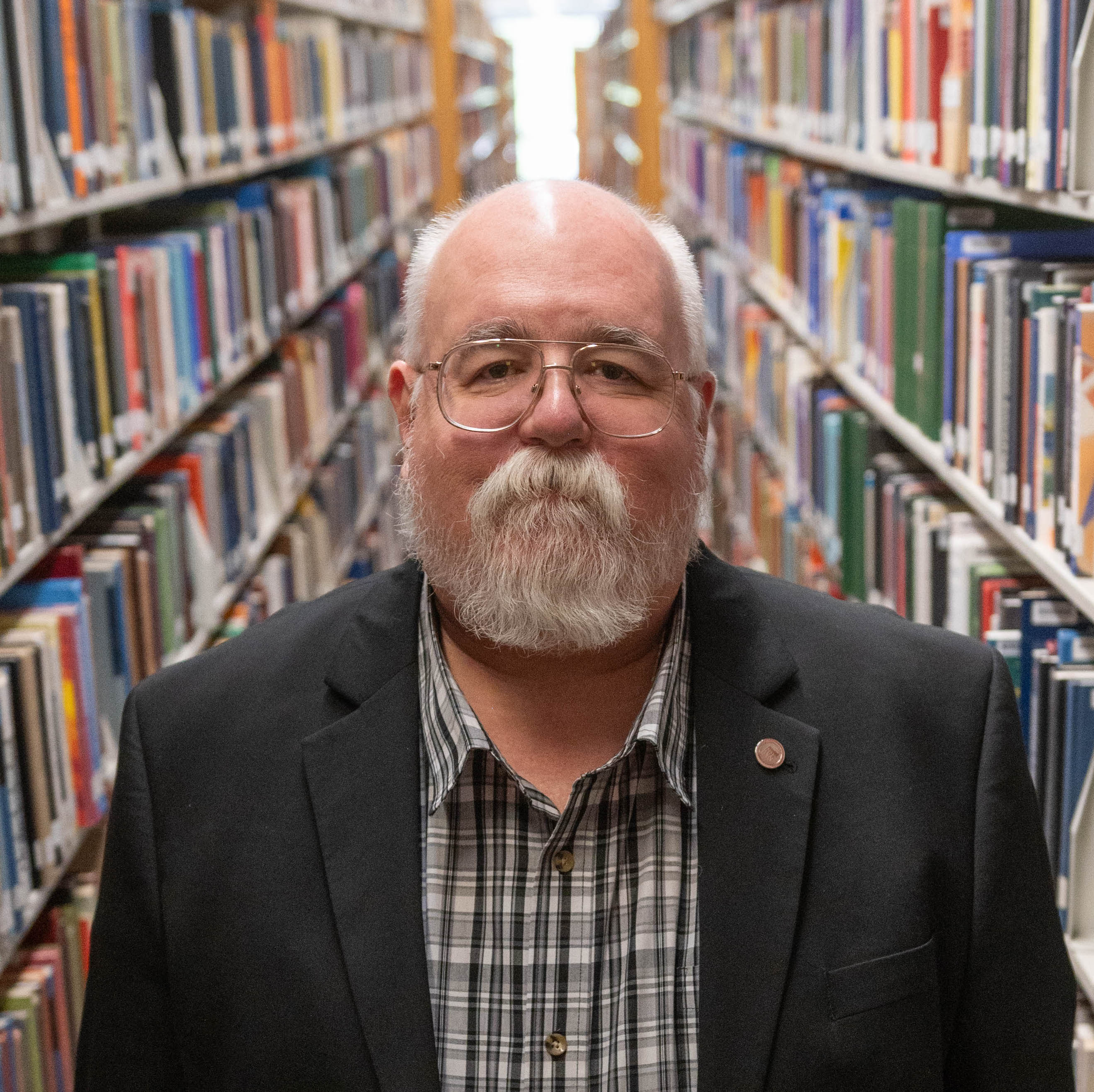 Headshot of Dean of the Library, Kevin Comerford