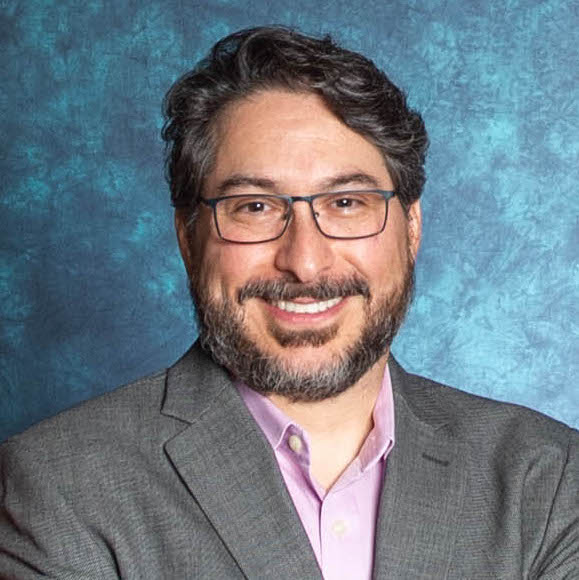 Headshot of Faculty Fellow for the Center of Latin American and Border Studies, David G. Ortiz Canseco. 