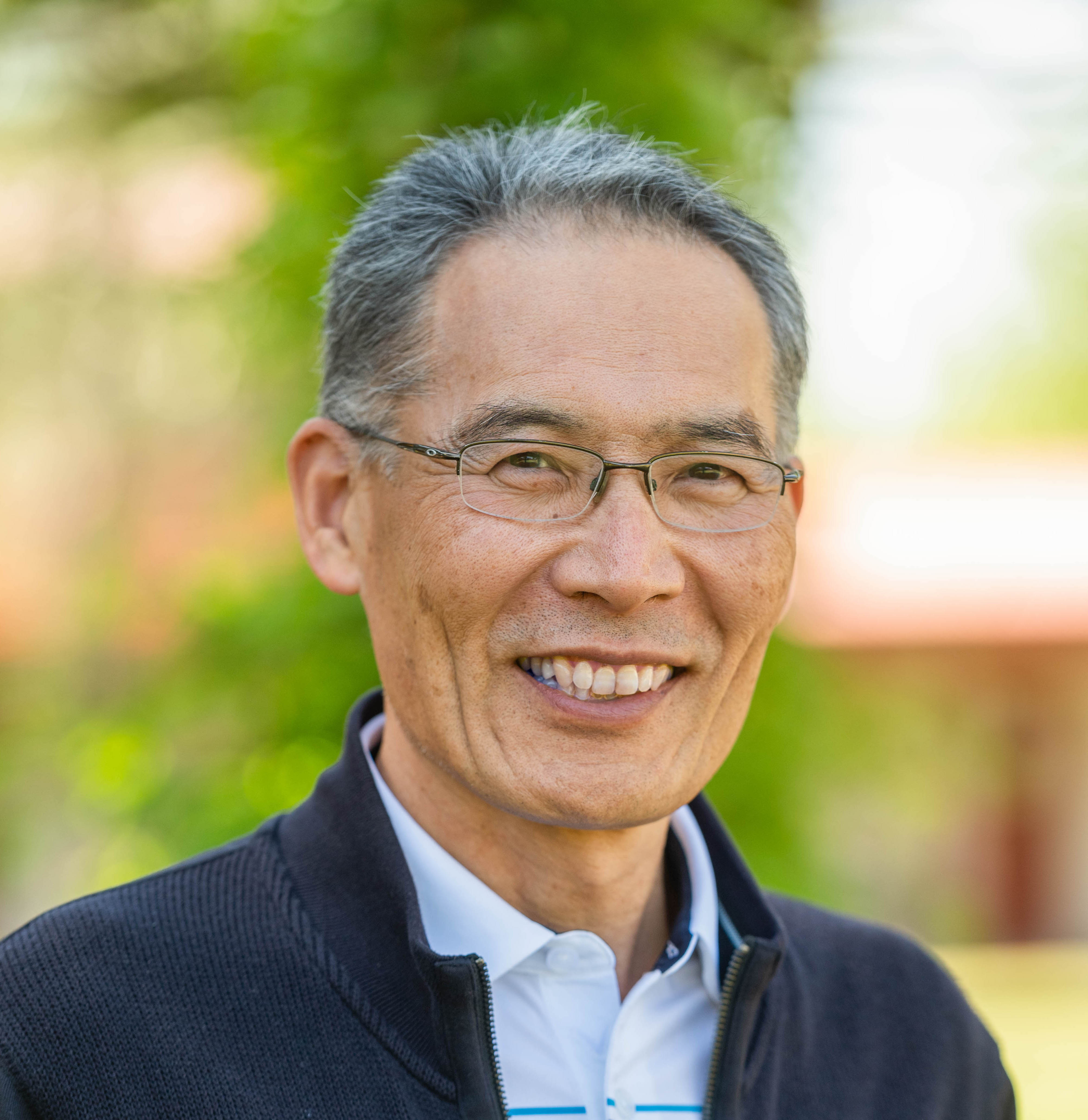 Headshot of Dean of the College of HEST, Yoshi Iwasaki