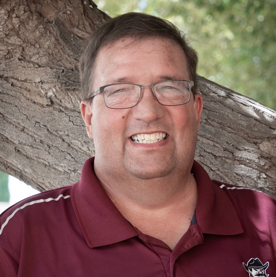 Headshot of Faculty Fellow Ryan Goss